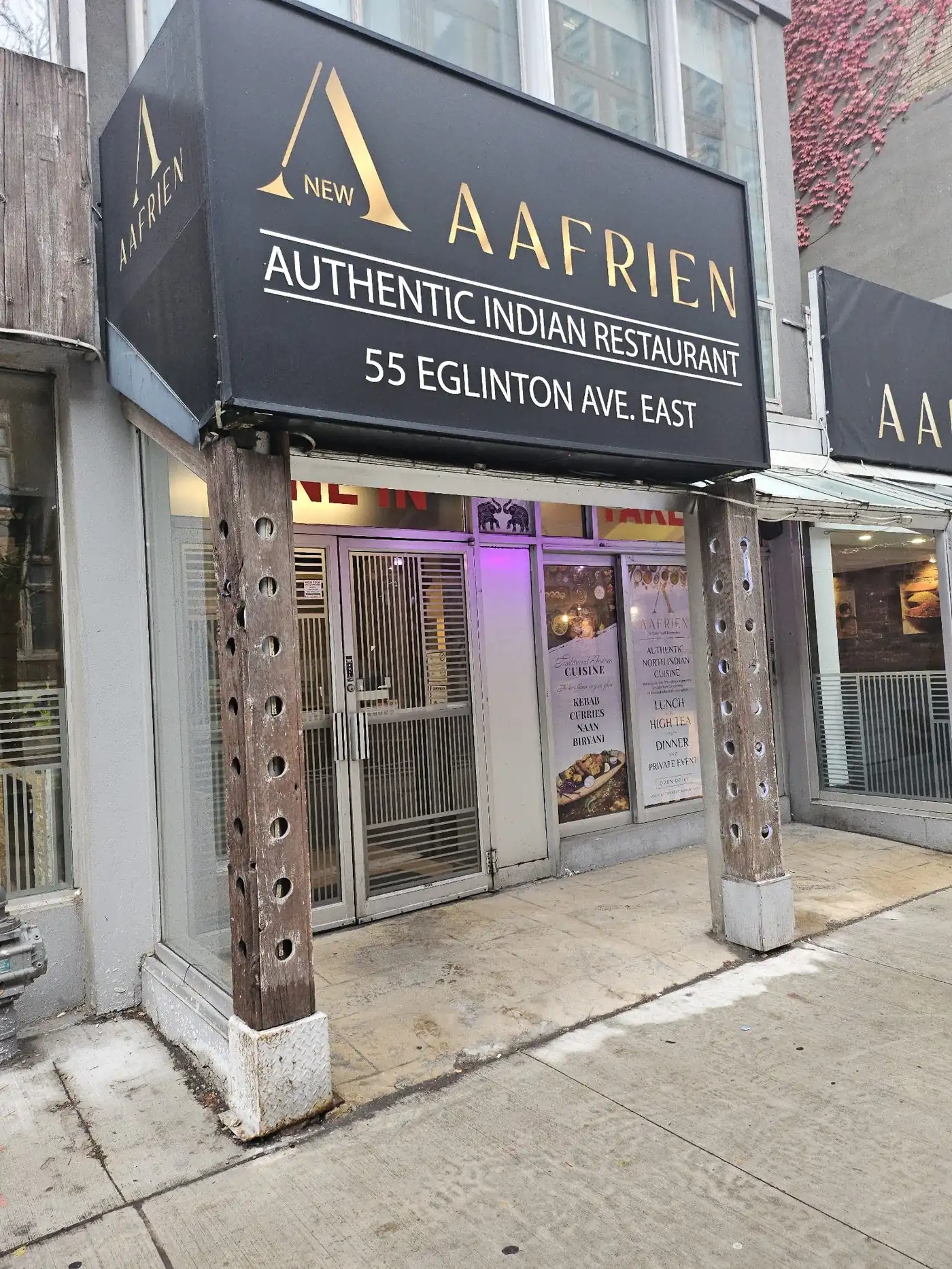 Aafrien Indian Restaurant storefront at 55 Eglinton Ave East, Toronto
